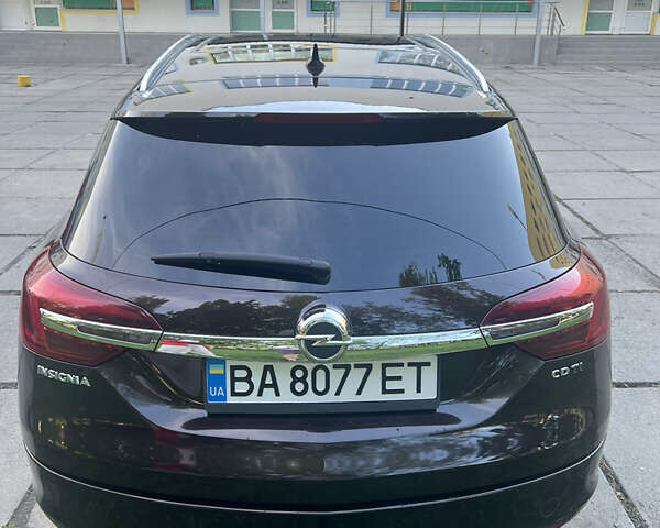 Коричневый Опель Инсигния, объемом двигателя 1.96 л и пробегом 205 тыс. км за 11500 $, фото 1 на Automoto.ua