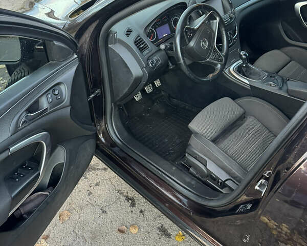 Коричневый Опель Инсигния, объемом двигателя 1.96 л и пробегом 218 тыс. км за 10700 $, фото 9 на Automoto.ua