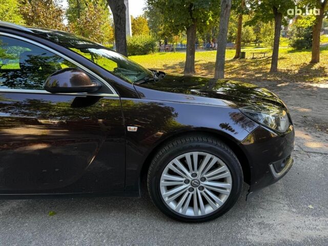 Коричневий Опель Інсігнія, об'ємом двигуна 2 л та пробігом 344 тис. км за 9990 $, фото 4 на Automoto.ua