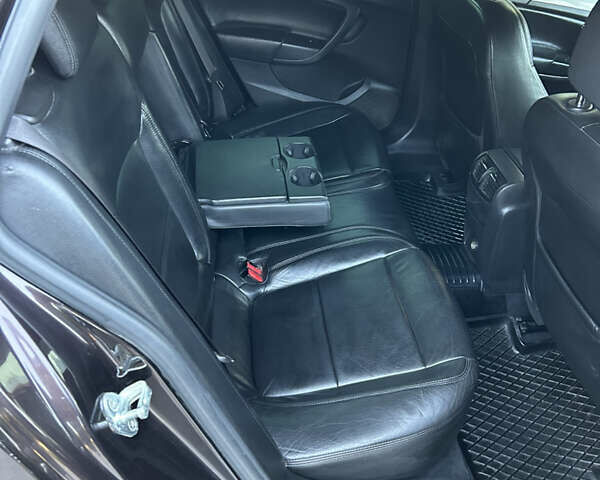 Коричневый Опель Инсигния, объемом двигателя 2 л и пробегом 260 тыс. км за 10850 $, фото 24 на Automoto.ua