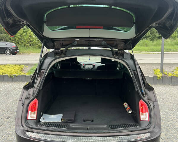 Коричневий Опель Інсігнія, об'ємом двигуна 1.96 л та пробігом 256 тис. км за 10200 $, фото 14 на Automoto.ua