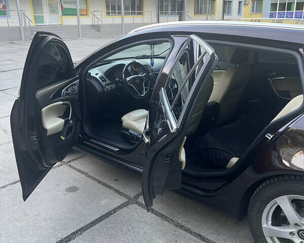 Коричневый Опель Инсигния, объемом двигателя 1.96 л и пробегом 205 тыс. км за 11500 $, фото 11 на Automoto.ua