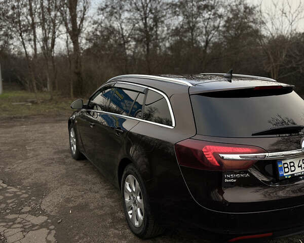 Коричневый Опель Инсигния, объемом двигателя 1.96 л и пробегом 240 тыс. км за 11499 $, фото 7 на Automoto.ua