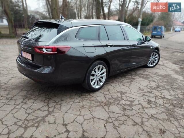 Коричневый Опель Инсигния, объемом двигателя 1.5 л и пробегом 163 тыс. км за 16000 $, фото 7 на Automoto.ua