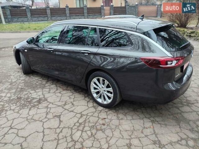 Коричневый Опель Инсигния, объемом двигателя 1.5 л и пробегом 163 тыс. км за 16000 $, фото 3 на Automoto.ua