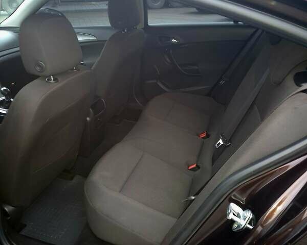 Коричневый Опель Инсигния, объемом двигателя 1.4 л и пробегом 217 тыс. км за 6499 $, фото 12 на Automoto.ua