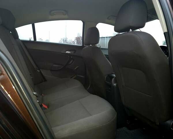 Коричневый Опель Инсигния, объемом двигателя 1.4 л и пробегом 217 тыс. км за 6499 $, фото 14 на Automoto.ua