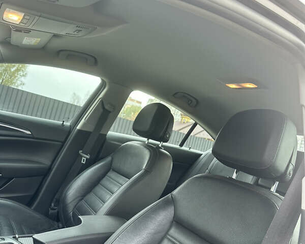 Коричневый Опель Инсигния, объемом двигателя 1.6 л и пробегом 158 тыс. км за 13800 $, фото 22 на Automoto.ua