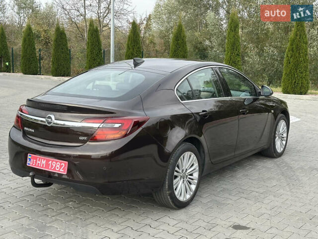 Коричневый Опель Инсигния, объемом двигателя 1.6 л и пробегом 158 тыс. км за 13800 $, фото 6 на Automoto.ua