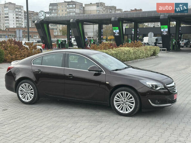Коричневый Опель Инсигния, объемом двигателя 1.6 л и пробегом 158 тыс. км за 13800 $, фото 8 на Automoto.ua