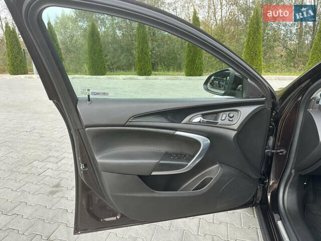 Коричневый Опель Инсигния, объемом двигателя 1.6 л и пробегом 158 тыс. км за 13800 $, фото 18 на Automoto.ua