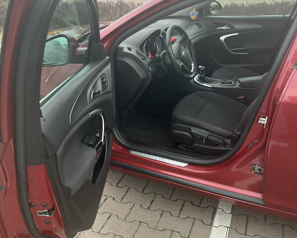 Опель Инсигния 2010 в Житомире на Automoto.ua Красный Опель Инсигния, объемом двигателя 2 л и пробегом 275 тыс. км за 7500 $, фото 12 на Automoto.ua