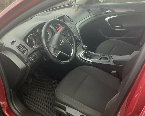 Опель Инсигния 2010 в Житомире на Automoto.ua Красный Опель Инсигния, объемом двигателя 2 л и пробегом 275 тыс. км за 7500 $, фото 6 на Automoto.ua