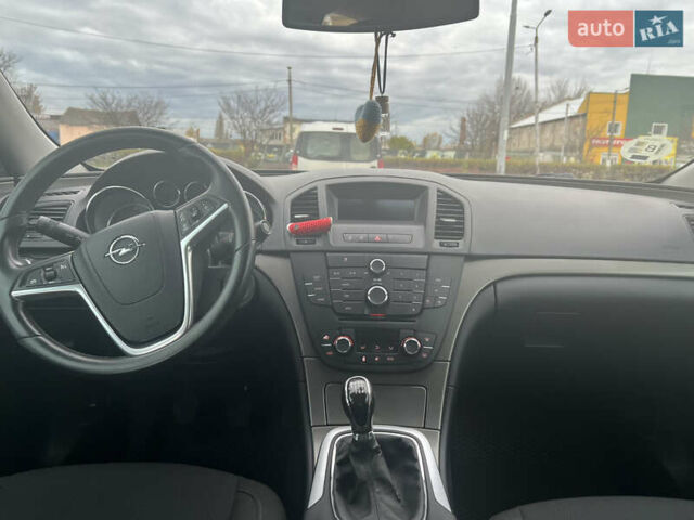 Опель Инсигния 2010 в Житомире на Automoto.ua Красный Опель Инсигния, объемом двигателя 2 л и пробегом 275 тыс. км за 7500 $, фото 10 на Automoto.ua