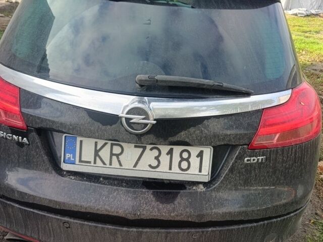 Красный Опель Инсигния, объемом двигателя 2 л и пробегом 312 тыс. км за 3700 $, фото 2 на Automoto.ua