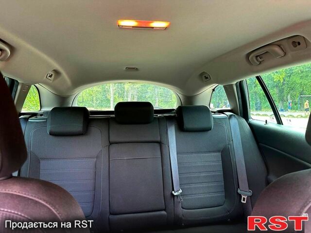 Червоний Опель Інсігнія, об'ємом двигуна 2 л та пробігом 221 тис. км за 7000 $, фото 12 на Automoto.ua