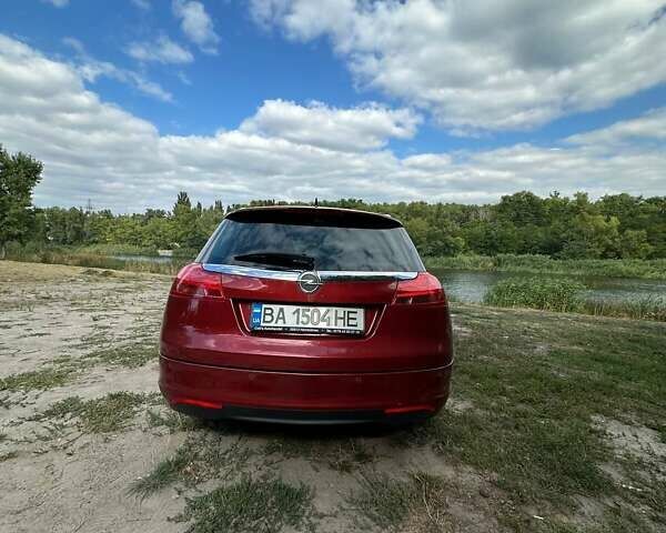 Красный Опель Инсигния, объемом двигателя 1.96 л и пробегом 221 тыс. км за 8000 $, фото 2 на Automoto.ua