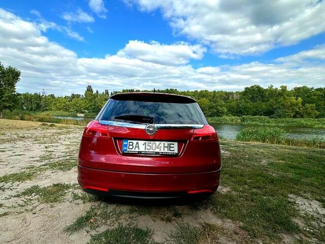 Червоний Опель Інсігнія, об'ємом двигуна 2 л та пробігом 221 тис. км за 7000 $, фото 4 на Automoto.ua