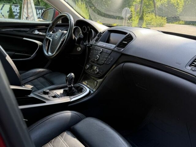 Червоний Опель Інсігнія, об'ємом двигуна 2 л та пробігом 230 тис. км за 7500 $, фото 12 на Automoto.ua