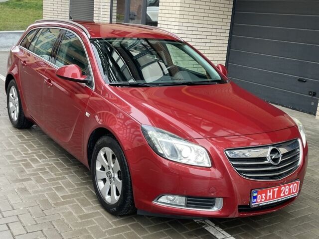 Червоний Опель Інсігнія, об'ємом двигуна 2 л та пробігом 210 тис. км за 6750 $, фото 3 на Automoto.ua