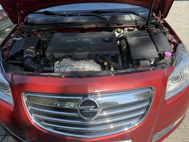 Червоний Опель Інсігнія, об'ємом двигуна 2 л та пробігом 230 тис. км за 7500 $, фото 9 на Automoto.ua