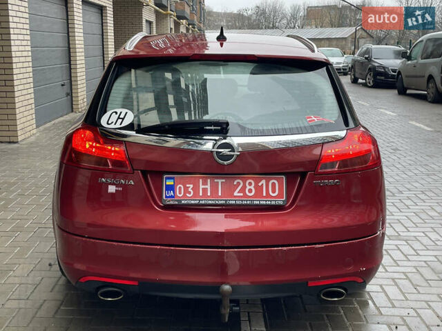 Червоний Опель Інсігнія, об'ємом двигуна 2 л та пробігом 210 тис. км за 6750 $, фото 13 на Automoto.ua