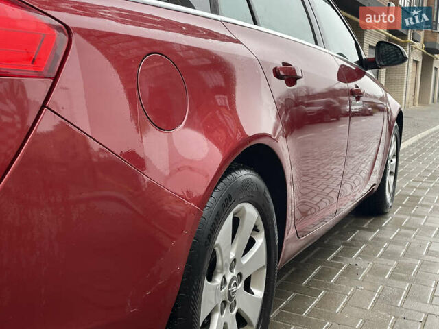 Червоний Опель Інсігнія, об'ємом двигуна 2 л та пробігом 210 тис. км за 6750 $, фото 15 на Automoto.ua