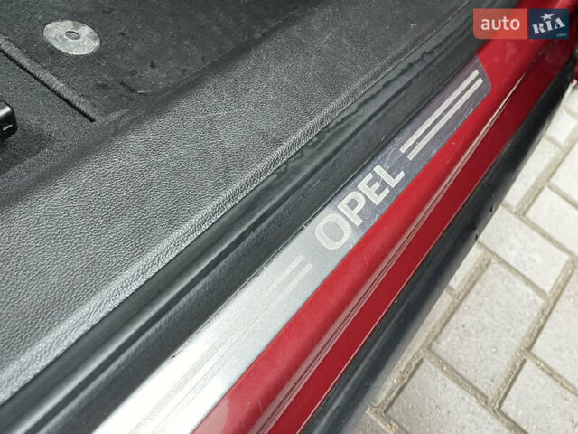 Червоний Опель Інсігнія, об'ємом двигуна 2 л та пробігом 210 тис. км за 6750 $, фото 45 на Automoto.ua