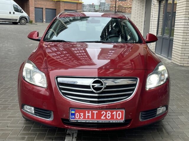 Червоний Опель Інсігнія, об'ємом двигуна 2 л та пробігом 210 тис. км за 6750 $, фото 2 на Automoto.ua