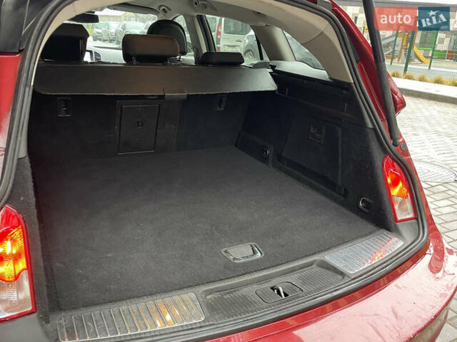 Червоний Опель Інсігнія, об'ємом двигуна 2 л та пробігом 210 тис. км за 6750 $, фото 55 на Automoto.ua