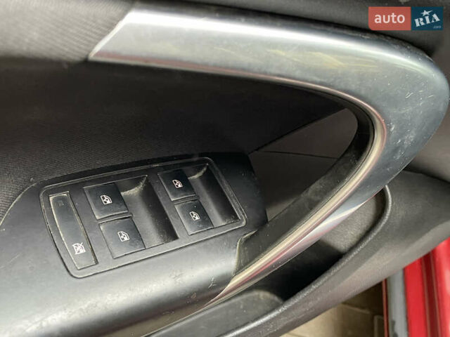 Червоний Опель Інсігнія, об'ємом двигуна 2 л та пробігом 210 тис. км за 6750 $, фото 39 на Automoto.ua