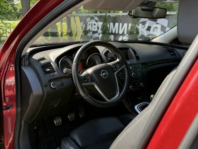 Червоний Опель Інсігнія, об'ємом двигуна 2 л та пробігом 230 тис. км за 7500 $, фото 6 на Automoto.ua