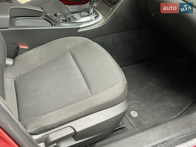 Червоний Опель Інсігнія, об'ємом двигуна 2 л та пробігом 210 тис. км за 6750 $, фото 41 на Automoto.ua