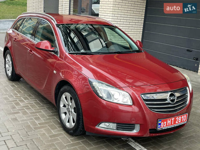 Червоний Опель Інсігнія, об'ємом двигуна 2 л та пробігом 210 тис. км за 6750 $, фото 5 на Automoto.ua