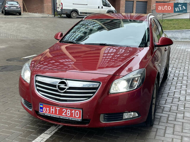 Червоний Опель Інсігнія, об'ємом двигуна 2 л та пробігом 210 тис. км за 6750 $, фото 2 на Automoto.ua