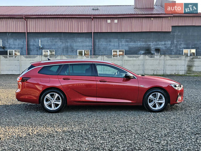 Красный Опель Инсигния, объемом двигателя 2 л и пробегом 164 тыс. км за 16999 $, фото 6 на Automoto.ua