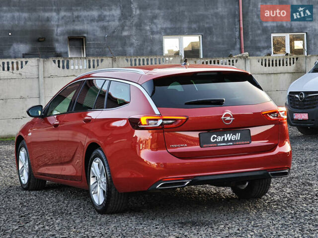 Красный Опель Инсигния, объемом двигателя 2 л и пробегом 164 тыс. км за 16999 $, фото 3 на Automoto.ua