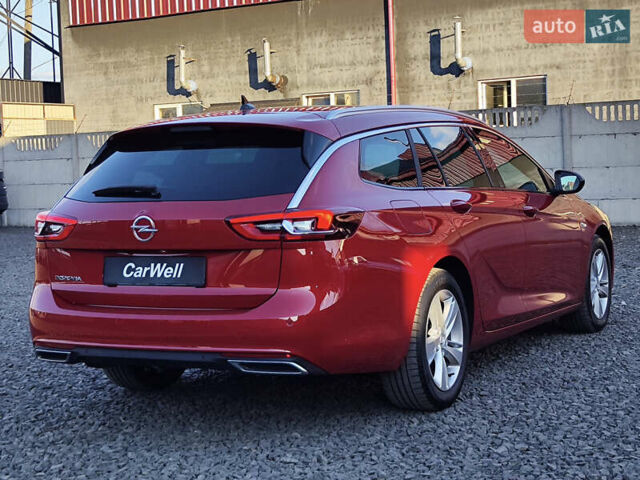 Красный Опель Инсигния, объемом двигателя 2 л и пробегом 165 тыс. км за 16999 $, фото 9 на Automoto.ua