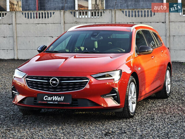 Красный Опель Инсигния, объемом двигателя 2 л и пробегом 164 тыс. км за 16999 $, фото 2 на Automoto.ua