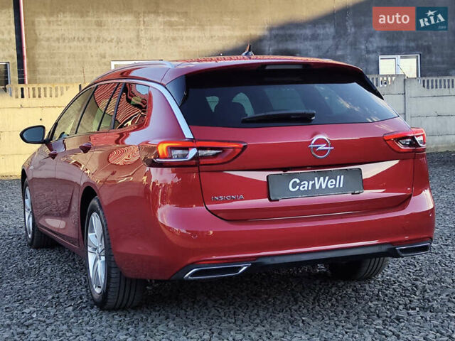 Красный Опель Инсигния, объемом двигателя 2 л и пробегом 165 тыс. км за 16999 $, фото 6 на Automoto.ua