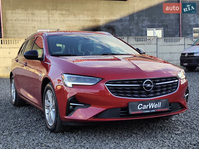 Красный Опель Инсигния, объемом двигателя 2 л и пробегом 165 тыс. км за 16999 $, фото 1 на Automoto.ua