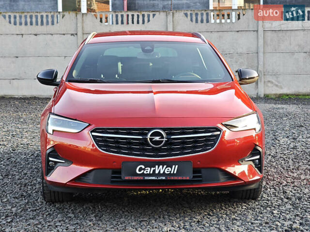 Красный Опель Инсигния, объемом двигателя 2 л и пробегом 164 тыс. км за 16999 $, фото 1 на Automoto.ua