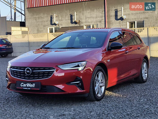 Красный Опель Инсигния, объемом двигателя 2 л и пробегом 165 тыс. км за 16999 $, фото 4 на Automoto.ua