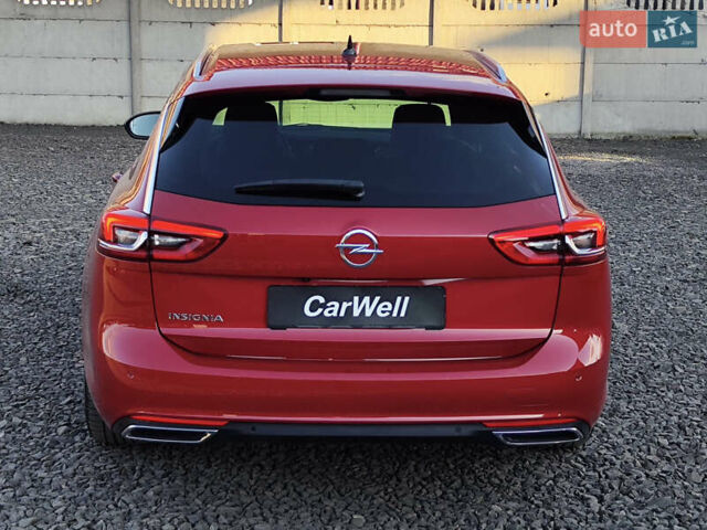 Красный Опель Инсигния, объемом двигателя 2 л и пробегом 165 тыс. км за 16999 $, фото 7 на Automoto.ua