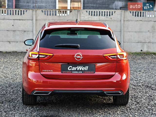 Красный Опель Инсигния, объемом двигателя 2 л и пробегом 164 тыс. км за 16999 $, фото 4 на Automoto.ua