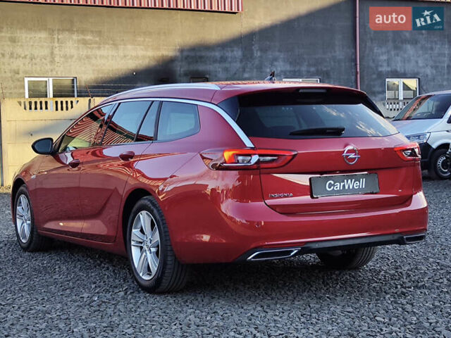 Красный Опель Инсигния, объемом двигателя 2 л и пробегом 165 тыс. км за 16999 $, фото 5 на Automoto.ua