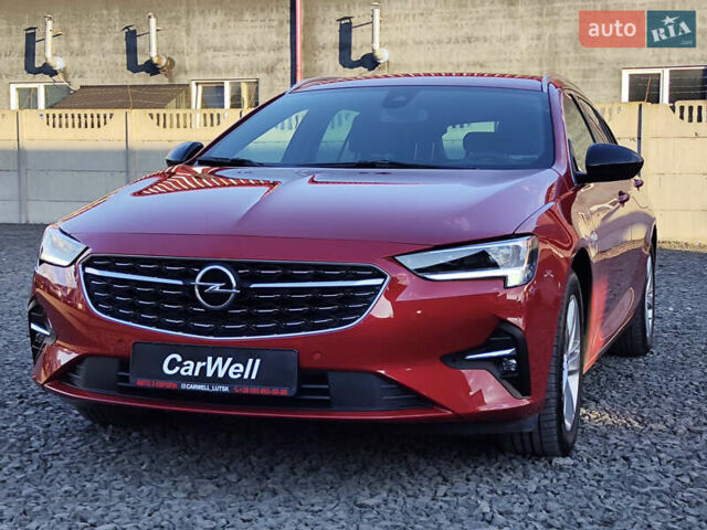 Красный Опель Инсигния, объемом двигателя 2 л и пробегом 165 тыс. км за 16999 $, фото 3 на Automoto.ua