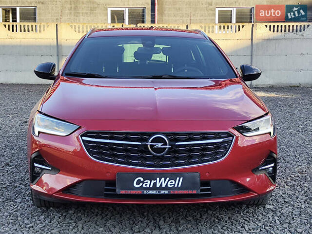 Красный Опель Инсигния, объемом двигателя 2 л и пробегом 165 тыс. км за 16999 $, фото 2 на Automoto.ua