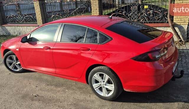 Красный Опель Инсигния, объемом двигателя 1.6 л и пробегом 130 тыс. км за 13999 $, фото 1 на Automoto.ua