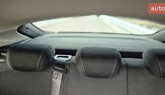 Красный Опель Инсигния, объемом двигателя 1.6 л и пробегом 130 тыс. км за 13999 $, фото 10 на Automoto.ua